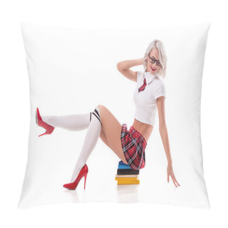 Personality  Young Seductive Blond Woman In College Uniform Sitting On Pile Of Books Isolated On White Pillow Covers