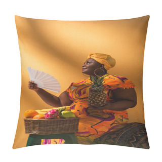 Personality  Middle Aged African American Woman Sitting Near Fruits And Holding Pineapple And Fan On Orange Pillow Covers