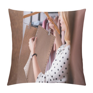 Personality  Showroom Proprietor Holding Hanger With Templates On Blurred Foreground Pillow Covers