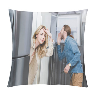 Personality  Selective Focus Of Curious Girlfriend And Boyfriend Looking At Fridge On Background In Home Appliance Store  Pillow Covers