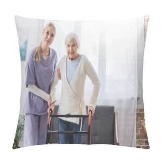 Personality  Happy Nurse And Senior Woman Looking At Camera Near Medical Walkers In Living Room Pillow Covers
