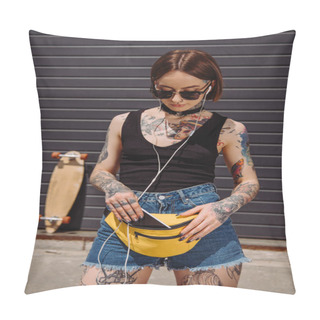Personality  Stylish Tattooed Woman Listening Music In Earphones And Putting Smartphone In Waist Bag  Pillow Covers