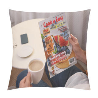 Personality  Man With Cup Of Coffee Reading Magazine In Armchair At Home, Closeup Pillow Covers