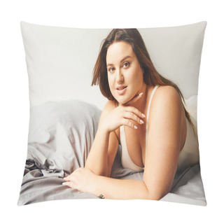Personality  Brunette Plus Size Woman With Natural Makeup Wearing Beige Bodysuit And Resting On Bed With Grey Bedding While Looking At Camera, Body Positive, Figure Type, Tattoo Translation: Harmony  Pillow Covers