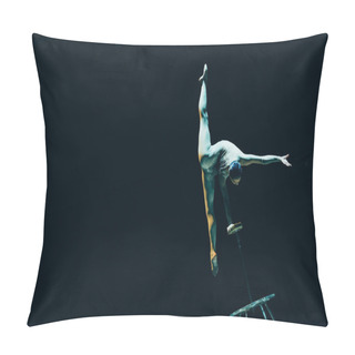 Personality  KYIV, UKRAINE - NOVEMBER 1, 2019: Gymnast Doing Split And Handstand In Circus Isolated On Black Pillow Covers