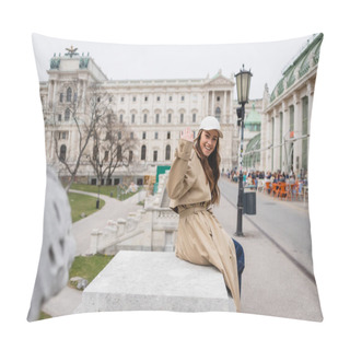 Personality  Happy Young Woman In Stylish Trench Coat And Baseball Cap Waving Hand Outside Pillow Covers