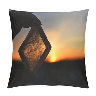 Personality  A Close Up Image Of Transparent Champagne Calcite Held Against A Glowing Orange Sunset.  Pillow Covers