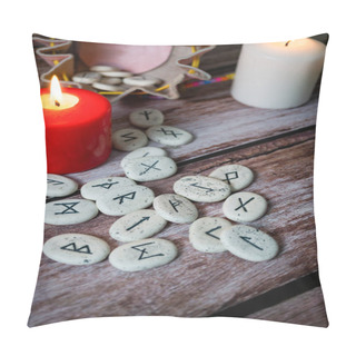 Personality  Rune Stones With Black Symbols For Fortune Telling With Candles On A Wooden Table Pillow Covers