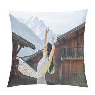 Personality  Side View Of Beautiful Young Woman Raising Hands While Standing Between Wooden Houses In Mountain Village, Mont Blanc, Alps Pillow Covers