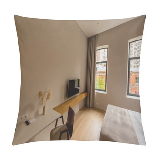 Personality  Wooden Chair Near Workspace And Flat Tv Screen On Wall In Bedroom Of Hotel  Pillow Covers