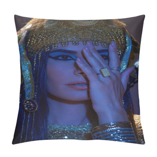 Personality  Portrait Of Woman In Egyptian Headdress Covering Face And Posing On Brown Background With Blue Light Pillow Covers