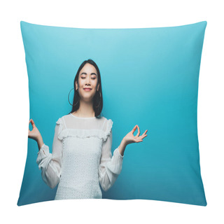 Personality  Happy Brunette Asian Woman Meditating With Closed Eyes On Blue Background Pillow Covers