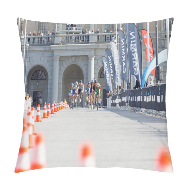 Personality  Distant group of fighting triathlete cyclists, royal castle in t pillow covers