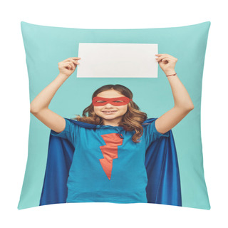 Personality  Carefree Preteen Girl In Superhero Costume With Cloak And Red Mask Holding Blank Paper Above Head And Looking At Camera On Blue Background, Happy Children's Day Concept  Pillow Covers