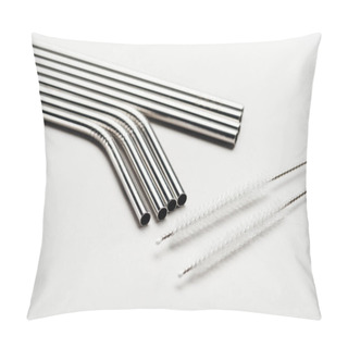 Personality  Close Up View Of Of Stainless Steel Straws And Cleaning Brushes On Grey Pillow Covers