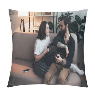 Personality  Beautiful Smiling Young Couple Sitting On Couch With Joysticks In Living Room Pillow Covers