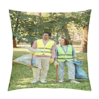 Personality  A Socially Active, Diverse Couple In Safety Vests And Gloves Stand In The Grass, Cleaning The Park Together In Harmony. Pillow Covers