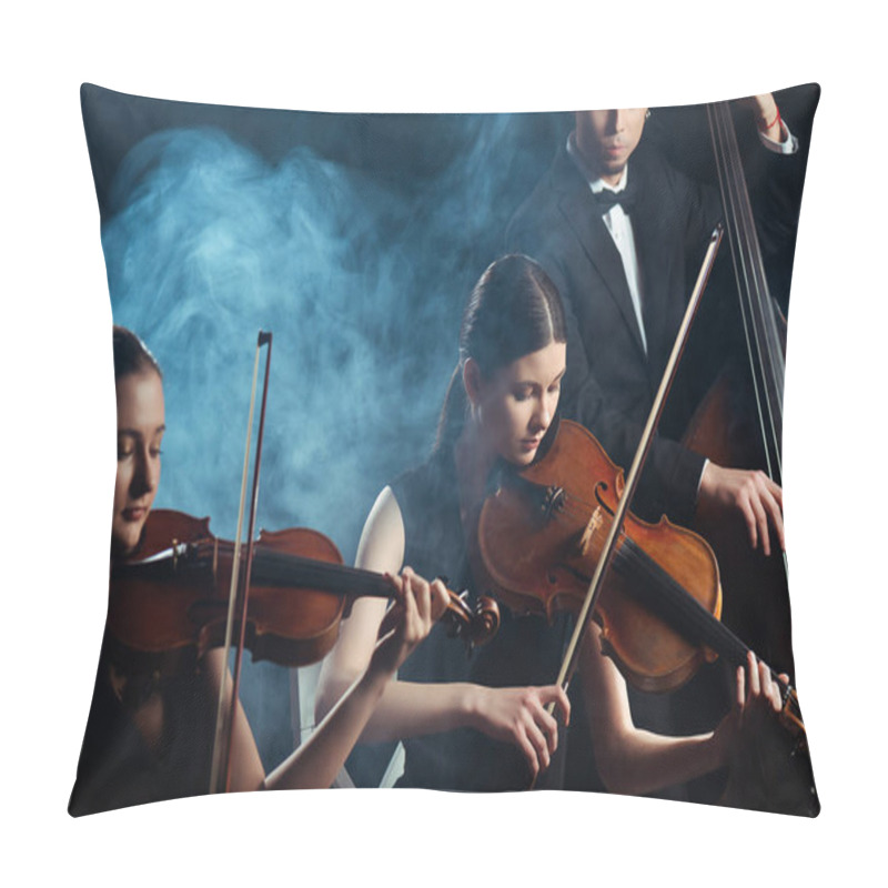 Personality  Trio Of Musicians Playing On Violins And Contrabass On Dark Stage With Smoke Pillow Covers