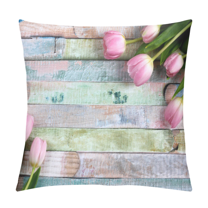 Personality  Bouquet of pink fresh tulips on colored wooden background with space for text - overhead view pillow covers