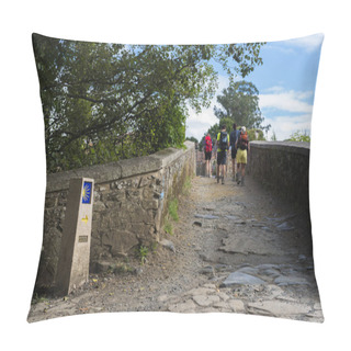 Personality  FURELOS, SPAIN - JULY 31, 2016: Some Young Pilgrims With Backpacks Cross A Medieval Bridge, Making The Camino De Santiago. Pillow Covers