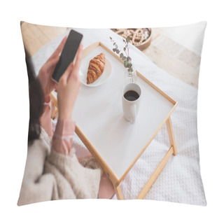 Personality  Partial View Of Young Brunette Woman Holding Cellphone Near Table With Coffee And Croissant In Bedroom Pillow Covers