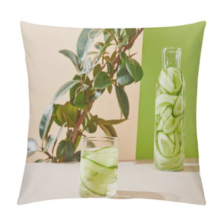 Personality  Selective Focus Of Glass And Bottle Filled With Clean Water And Sliced Cucumbers And Plant On Beige And Green Background  Pillow Covers
