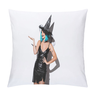 Personality  Smiling Girl In Black Witch Halloween Costume With Blue Hair Pointing With Hand On White Background Pillow Covers