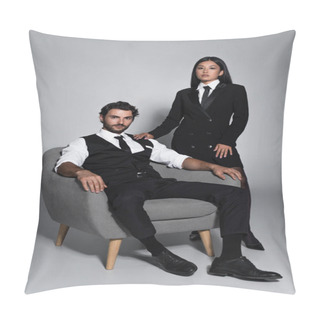 Personality  Elegant Man Sitting In Armchair Near Asian Woman In Black Blazer Dress On Grey Background Pillow Covers