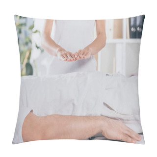 Personality  Cropped Shot Of Man Lying On Massage Table And Receiving Reiki Treatment Pillow Covers