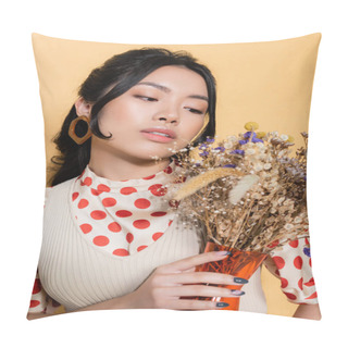 Personality  Portrait Of Stylish Asian Woman In Retro Clothes Looking At Flowers Isolated On Orange  Pillow Covers