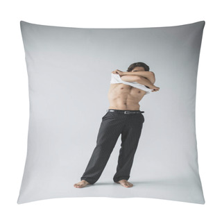 Personality  Full Length Of Sexy And Muscular Man In Trousers Taking Off White T-shirt On Grey  Pillow Covers