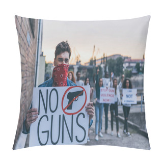 Personality  Selective Focus Of Man With Scarf On Face Holding Placard With No Guns Lettering Near Multicultural People  Pillow Covers