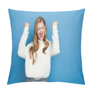 Personality  Happy Blonde Beautiful Woman In Sweater Showing Yeah Gesture Isolated On Blue Background Pillow Covers