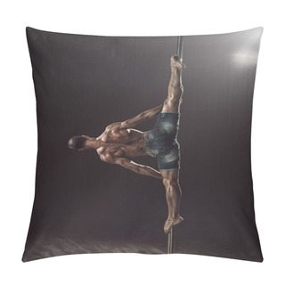 Personality  Man On The Pole Doing A Middle Split. Pole Dancing Muscular Athlete On The Black Background. Strong Male Fitness Model Executes A Flexible Trick.  Pillow Covers