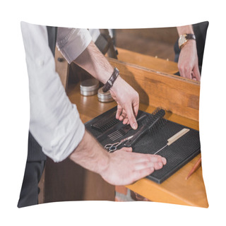 Personality  Cropped Shot Of Barber Taking Tools From Rubber Mat On Workplace Pillow Covers