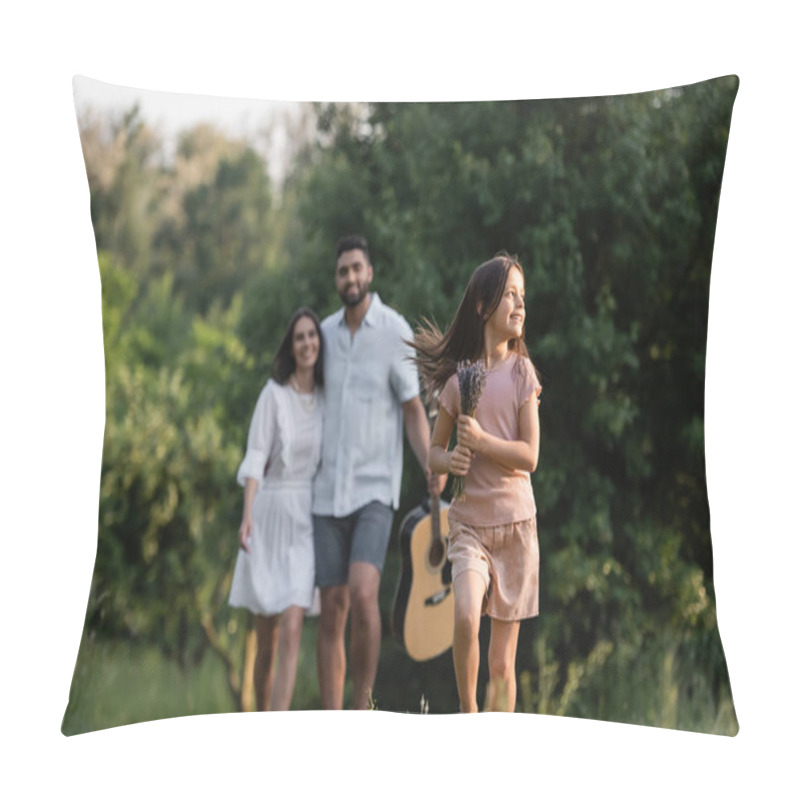 Personality  blurred couple near joyful girl running with lavender flowers on summer day pillow covers