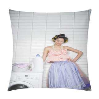 Personality  Asian Young Woman With Hair Curlers Standing With Hand On Hip In Ruffled Top, Pearl Necklace And Tulle Skirt Near Washing Bowl With Dirty Clothes On Modern Washing Machine With Detergent In Laundry Room  Pillow Covers