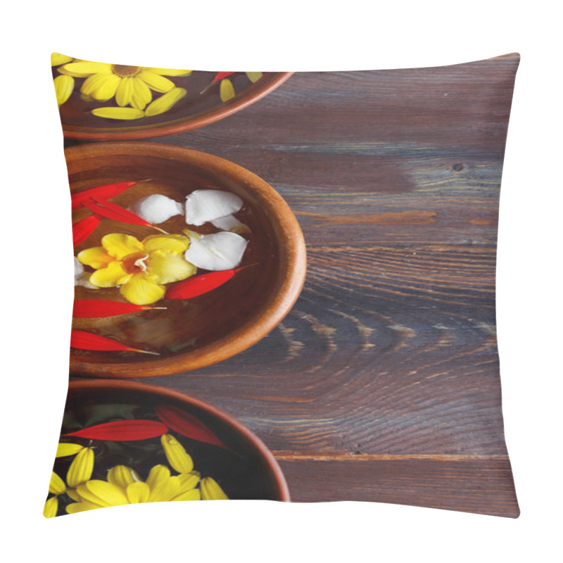 Personality  Flower petals in bowls, close-up, on wooden table background pillow covers