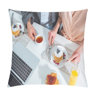 Personality  Cropped View Of Adult Couple Sitting At Table With Laptop While Having Breakfast In Morning Pillow Covers