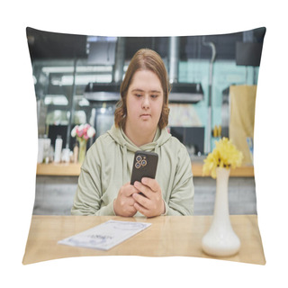 Personality  Young Woman With Down Syndrome Chatting On Smartphone Near Menu Card On Table In Modern Cafe Pillow Covers