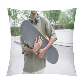 Personality  Partial View Of African American Man Smiling While Holding Skateboard Pillow Covers