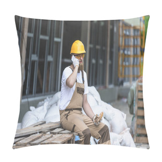 Personality  Young Construction Worker In Hardhat And Protective Googles Talking On Smartphone And Having Lunch With Sandwich  Pillow Covers