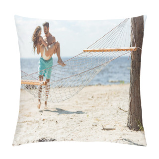 Personality  Selective Focus Of Man Holding Girlfriend On Hands, With Hammock On Beach On Foreground Pillow Covers