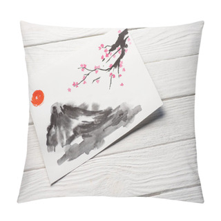 Personality  High Angle View Of Paper With Japanese Painting With Sun, Sakura Branches And Grey Hill On Wooden Background Pillow Covers