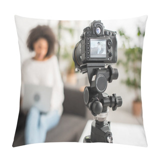 Personality  Selective Focus Of Digital Camera With Young African American Video Blogger Using Laptop On Display  Pillow Covers