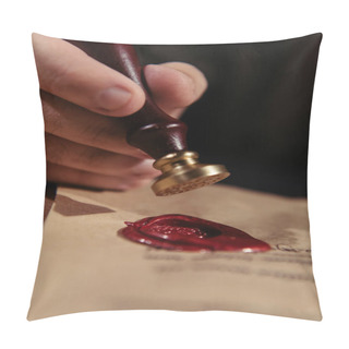 Personality  Close Up View Of Wax Seal In Hand Of Cropped Priest Near Parchment Isolated On Black Pillow Covers