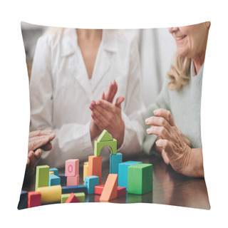 Personality  Cropped View Of Caregiver Applauding To Retired Couple While Playing With Wooden Toys Pillow Covers