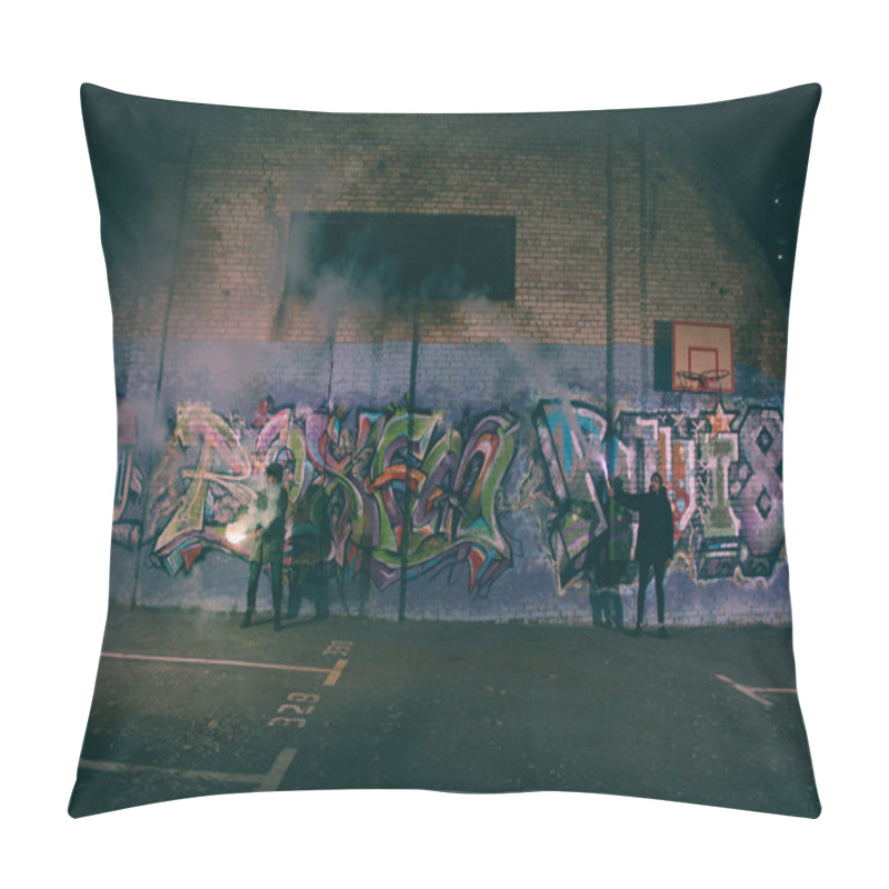 Personality  people holding smoke bombs and standing against wall with graffiti at night pillow covers