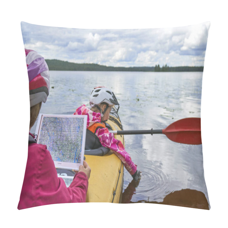 Personality  Woman reading a map sitting in kayak sailing along the lake in kayak hike pillow covers