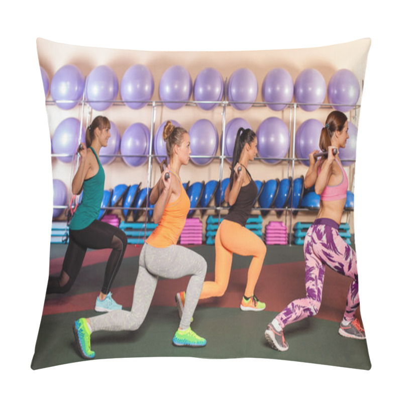 Personality  women doing a leg exercise in aerobics class pillow covers